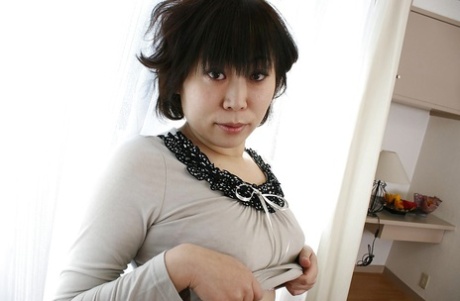 asian undressing top gallery