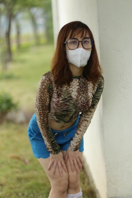 asian glasses adult image